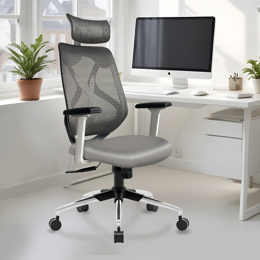 Gray office Mesh Chairs in a modern office setting with a desk and computer.